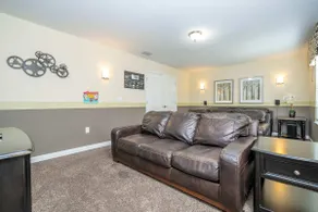 1400 ChampionsGate 8BR Home with Pool, Cinema & Game Room - Image 3