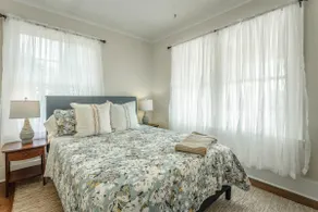 Adorable White Cottage |Close to Downtown|Sleeps 8 - Image 3