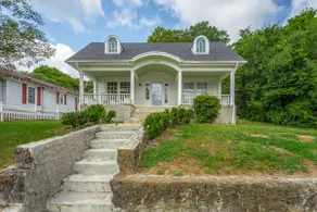 Adorable White Cottage |Close to Downtown|Sleeps 8 - Image 2