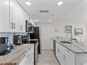Island Place 105 Amazing Views w/ Waterfront Pool! - Image 2