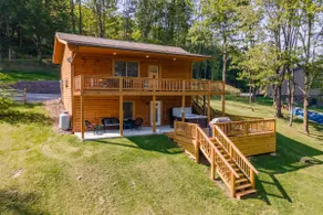 Cozy Cabin w/ Arcade, Deck & Fire Pit - Image 5