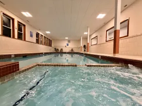 Overlooking Loon Mountain’s South Peak, this newly renovated 1BR condo offers indoor and outdoor pools, indoor hot tub, sauna, and game room access—just minutes to hiking and Loon Resort. Coin laundry available on site. - Image 2