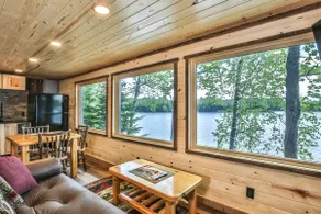 Remodeled lakeside resort cabin with fireplace, sandy beach, dock, firepit! - Image 2