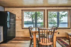 Remodeled lakeside resort cabin with fireplace, sandy beach, dock, firepit! - Image 5