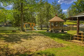 Stylish 4BR Lakefront Cabin w/ Hot Tub - Image 4