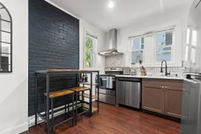 Charming Brick House Apartment with Free Parking - Image 2