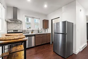 Charming Brick House Apartment with Free Parking - Image 5