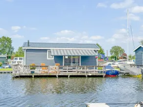Modern chalet with private jetty on the water - Image 2
