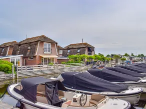 Holiday home with waterside terrace - Image 2