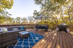 Modern w/Lake View + Large Deck + Enclosed Yard + Fire Pit + Game Room! - Image 2
