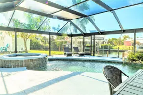 Pine Island Beach House!  *Gulf Access, Heated Pool, Hot Tub & Boat Dock* - Image 2