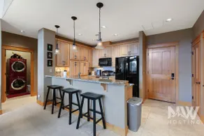 Riverstone—Top-Floor Condo, Modern Kitchen - Image 4