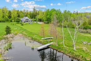 Waterfront Cottage · Fireplace · Kayaks + Dock - Image 3