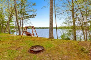 Modern Lakeside Gem with Dual Fireplaces & AC - Image 2