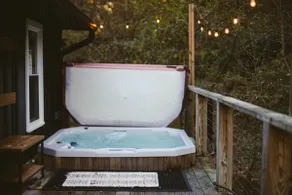 Walk-to-Downtown Retreat | Creekside + Hot Tub - Image 2