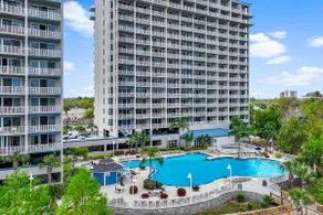 Lake-view 3rd-floor condo with hot tub, pools, balcony, shuttle service, & gyms - Image 2