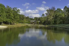 Large authentic 3-story log cabin adjacent to lake - Image 5