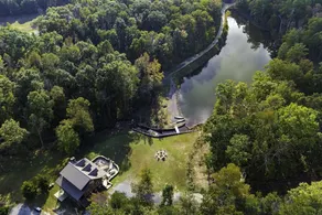 Large authentic 3-story log cabin adjacent to lake - Image 4
