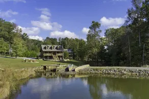 Large authentic 3-story log cabin adjacent to lake - Image 2