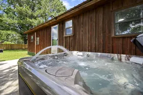 2Br Cabin with hot tub, BBQ, 55\" Smart TV, W/D. - Image 2