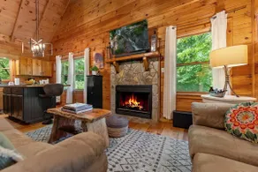 Bearfootin Pond Lodge-on water with paddleboat - Image 4