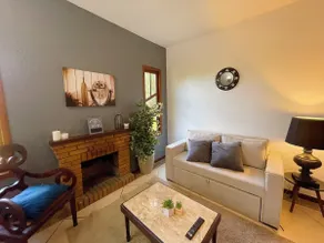 House with a fireplace in nature - Image 4