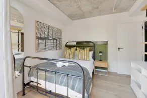 Stylish 2BR Retreat - Beach, Pool & WiFi Access - Image 5