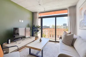 Stylish 2BR Retreat - Beach, Pool & WiFi Access - Image 3