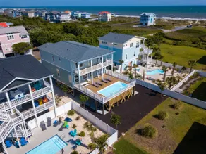 Sally's Sandcastle in Oak Island boasts 7 bedrooms, ocean views, and a private pool. - Image 4