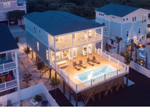 Sally's Sandcastle in Oak Island boasts 7 bedrooms, ocean views, and a private pool. - Image 5