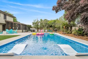 *New POOL with Sun Shelf <br>*5 beds<br>* Arcade<br>* Ping Pong<br>* Dog Friendly- Even a Doggy Door!<br>* Astro Turfed Yard<br>* 15 min to Downtown, 25 min to Pensacola Beach<br>* Kids Room with Toys, Crib, and High Chair<br>* Game Room Overlooking - Image 4