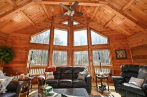 Cozy Kinsman Cabin in the woods w/Hot Tub - Image 3