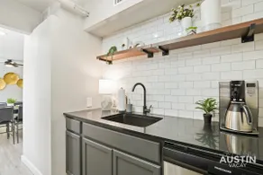 Walk to Restaurants or Cook in Subway Tile Kitchen - Image 2