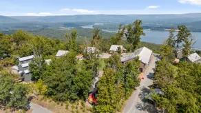 This is IT Cabin with a hot tub, fire pit, & indoo - Image 3
