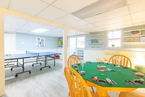 Spacious Stone Fire Pit Game Room - Image 4