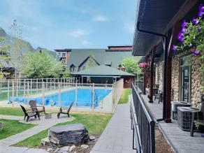 Enticing Mountain Chalet with Pool & Hot Tub - Image 3