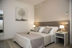 Camelot Apartments - Merlino - Image 2