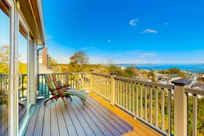Historic Waterfront Gem with Balcony Views - Image 3