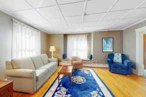 Historic Waterfront Gem with Balcony Views - Image 2