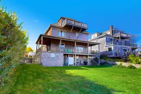 Historic Waterfront Gem with Balcony Views - Image 5