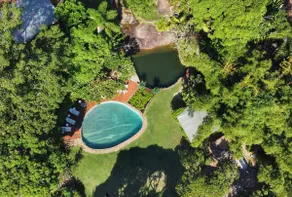 House suspended over the waterfall in paradise - Image 3