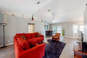 3BR sun-soaked home with enclosed pool, W/D, & AC - Image 3