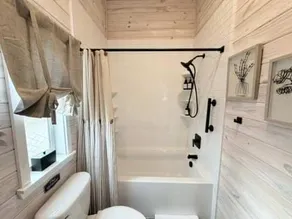 Cozy 1BR Tiny Home with Pool Access and Free Tix - Image 4