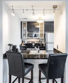 Spacious 2BR | Desk+WiFi | Gym+Rooftop - Image 2