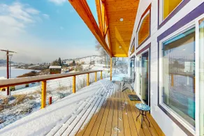 3BR water view home with deck & open layout - Image 2