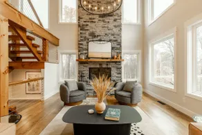 Woodland Retreat: Modern Barn with Stone Fireplace - Image 2