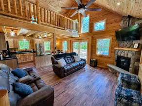73R: New log home on quiet side street with AC! - Image 2