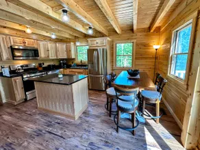 73R: New log home on quiet side street with AC! - Image 3