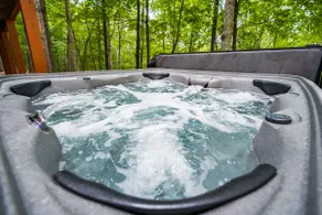 Cozy cabin w/ hot tub & fire pit at Woods Resort - Image 3