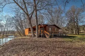 Pet Friendly Creekside Cabin + Hot Tub + Fire Pit - Image 4